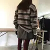 Corea del Sur Dongdaemun 2026 Otoño/Invierno Suéter de lana holgado a rayas con cuello polo