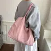 Bolsa tote de lona para mulheres, novo modelo 2026, grande capacidade, simples e casual, adequada para o trajeto diário, bolsa de ombro para o trabalho diário