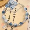 [Caixa com 100 Peças Atacado] Barraca de Exposição de Templo de Mercado Noturno Pulseiras Vidro Vidro Ornamentos de Mão Novo Estilo Chinês Estilo Quente