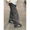 Pantalones de hiphop estilo americano diseño de etiquetado pantalones de asalto funcionales para exteriores para hombre pantalones casuales rectos de nicho vintage