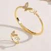 Moda Transfronteriza Europea y Americana Exquisito Conjunto de Anillo y Pulsera Completa de Diamantes Mariposa Madreperla Abrible Joyería de Mano de Pulsera de Lujo Ligero de Gama Alta