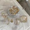Explosiones transfronterizas arte de uñas de 4 colores sueño cristal de hielo alto brillo ópalo nube brocado polvo polarizado ultrafino papel de hoja de oro joyería para uñas
