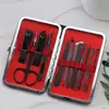 Set de cortauñas de acero inoxidable negro en stock al por mayor pinzas para cutícula cuchillo de pedicura aguja para acné herramientas de belleza