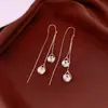 Pendientes de borla con flor de trébol de circonita vintage con un toque de alta gama, pendientes versátiles y de moda al por mayor