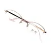 Montura de gafas de medio aro ovalada simple retro de titanio puro al por mayor para cara pequeña miopía montura de gafas de placa de montura pequeña para mujer
