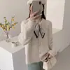 Cardigã de tricô com gola redonda para mulheres, novo estilo coreano outono e inverno, suéter casaco solto e modelador, design único, top versátil