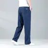 Calça Jeans Tencel Xintang Guangzhou para Homens, Novo Estilo Outono, Calça Reta Solta Azul Claro, Calça Masculina de Seda Gelada, Super Nova