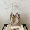 2026 moda nueva transfronteriza simple bolsa de mano de gran capacidad bolsa de hombro casual coreana de lunares bolsa de axila