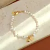 Pulseira de Pérolas de Água Doce Baroque Coração da Sorte Alto Brilho, Toque de Luxo Leve Nicho High-End, Joia Novo Estilo 2026
