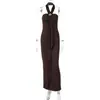 Moda femenina europea y americana otoño 2026 nuevo estilo vestido halter de moda que ciñe la cintura con tirantes fluidos, elegante vestido tubo ajustado al cuerpo venta al por mayor
