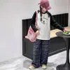 Conjunto de Camisetas de Manga Longa para Meninas Primavera e Outono 2026 Novo Estilo Roupas de Outono Infantis Calça Xadrez Casual Tendência
