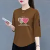 Camiseta de manga corta de moda para mujer para comercio exterior transfronterizo, corte holgado, adelgazante, rejuvenecedora, top versátil de manga tres cuartos, moderno