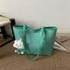Bolsa de ombro tote tecida simples casual versátil de grande capacidade, moda verão 2026, tendência