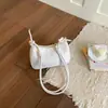 Bolsa de Axila Moda Retrô para Mulheres Nova Primavera 2026 Simples Transversal Bolsa Dumpling Estilo Coreano Bolsa de Ombro de Alto Valor para Mulheres