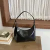 Bolsa Retro de Axila Feminina 2026 Novo Estilo Fashionável Chique Bolsa de Ombro Único Transversal Bolsa de Bolinho de Alto Valor Bolsa de Mão