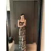 Vestido Retro Único Super Estiloso Acinturado Slim com Alça Fina Estilo Férias na Praia Vestido Floral 2026 Verão Novo Modelo