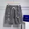 Bermudas de mezclilla rasgadas de moda para hombre talla grande 2024 marca de moda pantalones medios de verano holgados para hombre pantalones holgados de cinco puntos a la cintura
