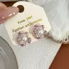 Brincos de pérola e flor vintage franceses doces e etéreos para primavera e verão para mulheres, design de nicho de luxo leve, brincos com charme de fada