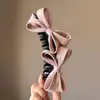 Presilha de banana moderna e estilosa para mulheres, versátil para o uso diário, presilha de cabelo de alto valor com bolinhas, acessório de cabelo simples de garra com laço estilo coreano