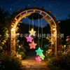 Nueva luz de campanilla de viento de Papá Noel alimentada por energía solar transfronteriza, luz de estrella para jardín exterior, luz decorativa de huevo hueco