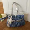Bolsa de Ombro Única Versátil de Alta Qualidade para Viagem Transfronteiriça Verão 2026 Nova Exclusiva Moda Nicho Design Único de Ombro Sob o Braço Modelo Saco