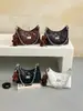 2026 Nueva Bolsa de Hombro con Cadena de Rejilla de Diamantes para Mujer Bolso de Hombro Retro Pequeño Estilo Chanel Piel Suave Versátil para Viajes Diarios Bolso Cruzado