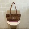 Otoño 2026 Nuevo Bolso de Hombro Individual de Moda Casual Versátil Retro con Hebilla de Cuero Escarchado Gran Capacidad