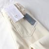 Pantalones de mezclilla holgados de color blanco cremoso con cintura alta y forro polar para mujer, otoño e invierno 2023