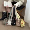 Bolsa balde portátil popular literária e fresh deste ano para mulheres, Novo Estilo Outono 2026, bolsa simples de ombro único, bolsa transversal para o dia a dia