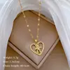 [Aço titânio] amor olho vermelho urso luz de luxo elegante lindo colar de diamante cheio de mulheres all-match clavícula cadeia de aço de titânio