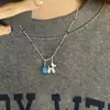 Estilo nuevo de primavera y verano, cadena para clavícula con colgante de florcitas de colores, collar para mujer con colgante de manzana roja lindo