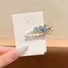 Exquisito y de alta gama clip para el pelo con pedrería estilo coreano para mujer, nuevo modelo 2026, pinza de pico de pato para la frente, pasador recto para flequillo lateral
