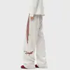 Pantalones deportivos para hombre para primavera y otoño 2026, marca nueva y de moda, pierna recta holgada, estilo Hong Kong, a rayas, fluidos, pantalones largos casuales