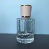 Botella de perfume de alta gama de 50 ml Botella de perfume vertical de tira portátil Botella pulverizadora cosmética Botella de vidrio vacía