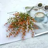 Popular de Outono Planta Verde Simulada Folha de Dinheiro Eucalipto Pequeno Lótus Flor de Chá Buquê Flor de Plástico Decoração de Casa ao Ar Livre