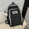 Mochila Simples de Grande Capacidade Estilo Novo 2024 para Alunos do Ensino Fundamental e Médio Design de Mochila para Alunos Masculinos e Femininos