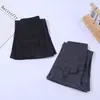 Pantalones cargo acampanados negros para niña para otoño, adecuados para la escuela y para usar al aire libre. Pantalones cargo de tiro alto para niños, adelgazantes, con un ligero acampanado, disponibles en stock