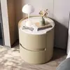 Mesa de cabeceira redonda minimalista italiana, criado-mudo de laje de rocha de luxo leve, armário de armazenamento de quarto moderno simples de madeira maciça de alta qualidade