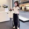 Nueva Camiseta de Verano Moderna y Elegante para Niños Conjunto Casual de Dos Piezas para Niñas Atuendo de Verano con Mangas Cortas para Niñas 2026