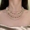 Collar de apilamiento de diamantes de colores y perlas multicapa para mujer, diseño de nicho de lujo ligero vintage, cadena elegante para la clavícula, lujo ligero de primavera de nicho