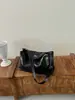 Bolso de mano de moda transfronterizo para mujer, nueva colección 2026, con un diseño retro de alta gama, adecuado para ir al trabajo, y se puede llevar como bolso de hombro o bolso cruzado