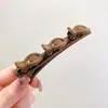 Otoño e Invierno flocado trenzado clip para el cabello femenino flequillo lateral clip artefacto para acabar con el cabello suelto celebridad de internet horquilla para la frente adorno para la cabeza