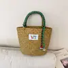 Bolsas Tejidas a Mano para Mujer, Moda Tendencia Primavera y Verano 2026, Bolso Cubo de Paja Súper Popular para Vacaciones en la Playa