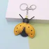 Llavero Divertido y Creativo de Cuero de Insecto Mariquita Lindo Colgante de Bolso Mariquita de Siete Puntos Llavero
