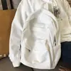 Mochila escolar de lona retrô para estudantes estilo ins feminina mochila versátil para estudantes do ensino médio feminino cor sólida simples mochila de campus masculina
