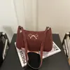 Moderna Lazo 2025 Nuevo Estilo Coreano Color Sólido Gran Capacidad Elegante Bolso de Hombro o Axila para Viajes Diarios para Mujer