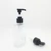 Botella de loción con boca de tornillo rayada 180ml Botella con cabeza de bomba de presión Botella de vidrio Botella de loción vacía transparente