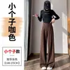Foto real de los nuevos pantalones casuales de lana de pierna ancha, de pierna recta, largos hasta el suelo, de cintura alta y forrados de polar para mujer, otoño 2026