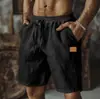 2025 nuevos pantalones cortos de algodón y lino con cordón cintura elástica pierna recta color liso transpirables diarios playa cinco pantalones casuales