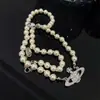 Colar com Pingente de Pérola e Zircônia Saturno, Elegante Personalizado, Corrente de Clavícula de Alto Padrão, Joia de Moda de Luxo Acessível de Nicho